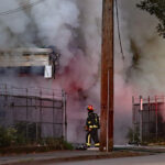 Fire at Surrey strip mall started by a car fire