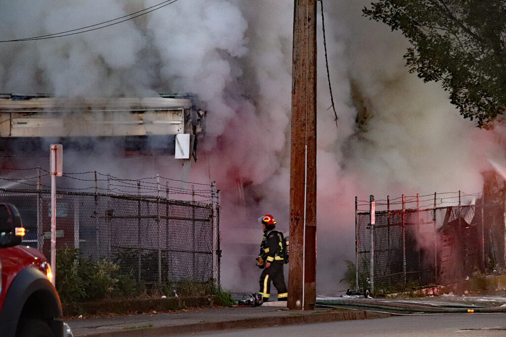 Fire at Surrey strip mall started by a car fire