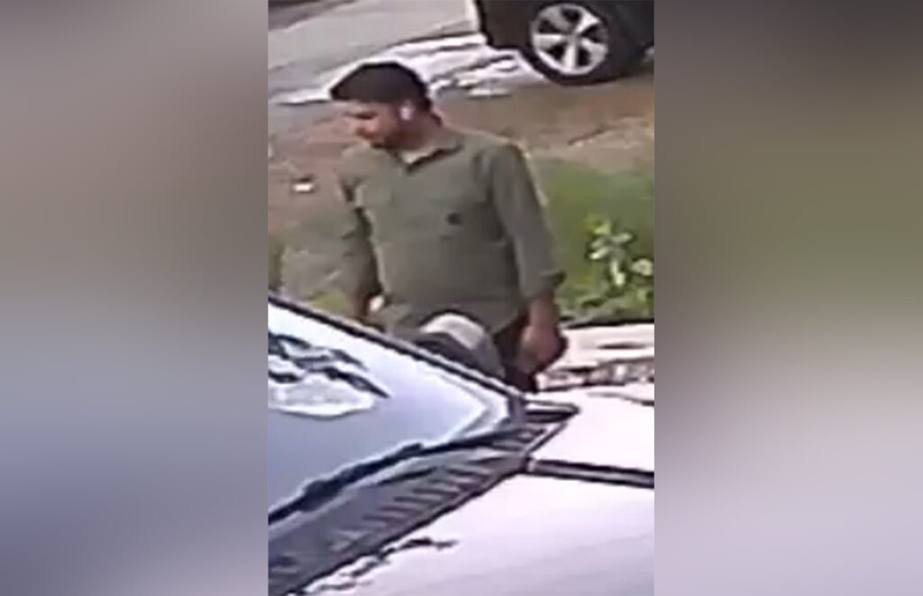 Police in Surrey seeking help identifying alleged fraudster